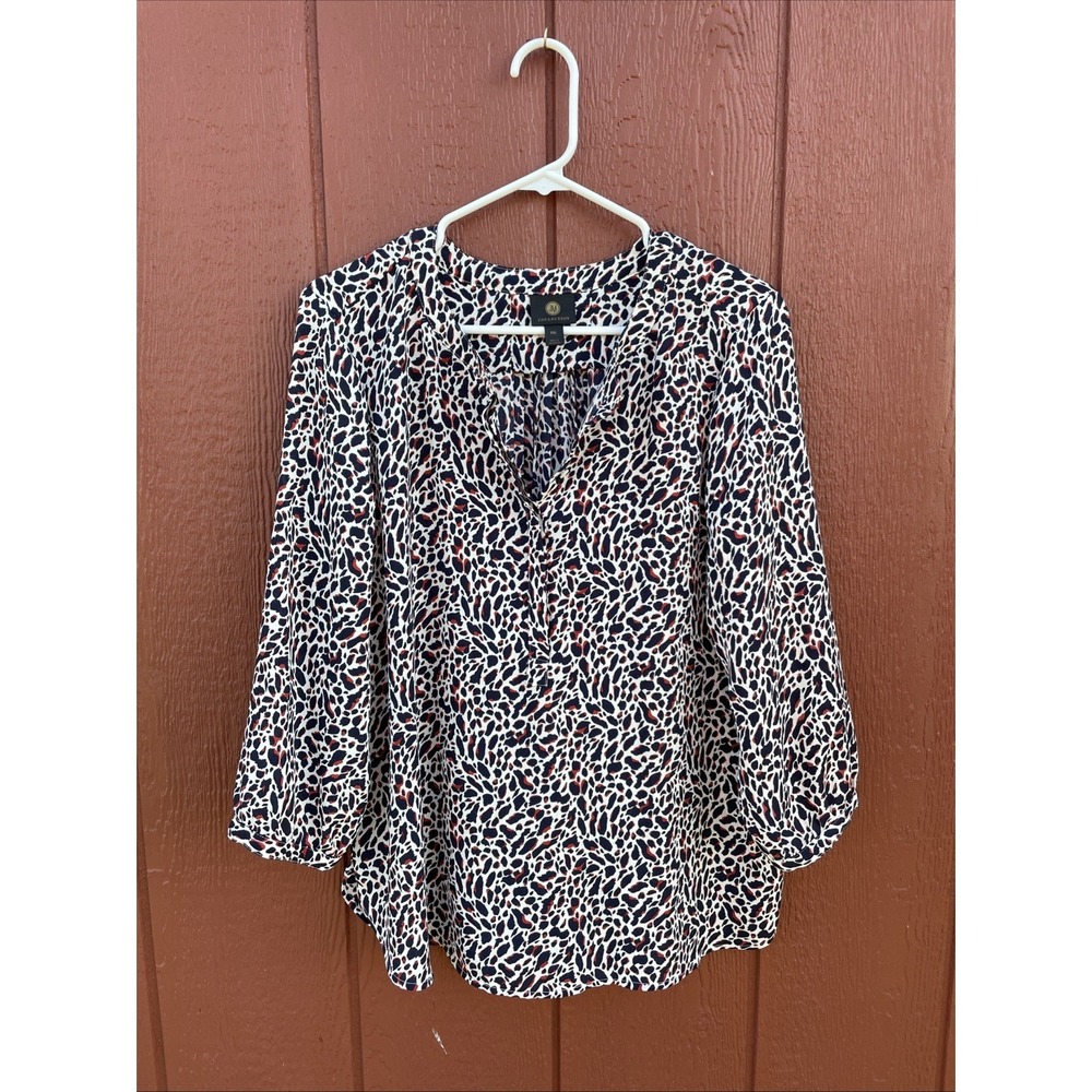 JM Collection Pleated-Back Blouse Animal print navy, white, and red.